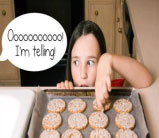 Picture of girl taking a cookie - Oooooo I'm telling!