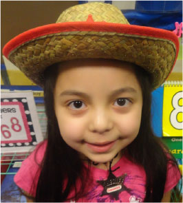 Photo: Girl student with cowboy hat