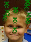 Image: Photo of boy with frog images